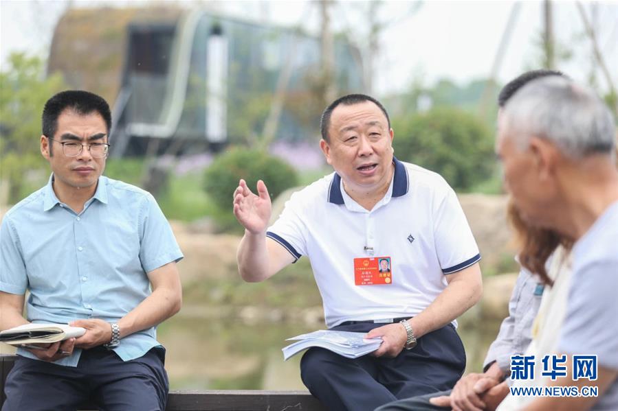（新華全媒頭條·兩會精神看落實·圖文互動）（2）整體謀劃、系統(tǒng)升級、全面提升——落實全國兩會精神織牢織密公共衛(wèi)生防護(hù)網(wǎng)